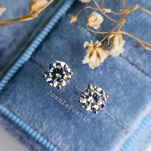 1CTW round four prong white diamond stud earrings in sterling silver